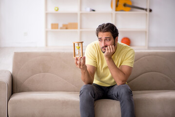 Young man staying at home during pandemic