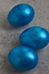 beautiful festive chicken eggs in blue color