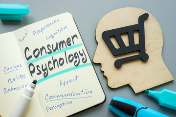 Consumer psychology notes and a shopping cart. - obrazy, fototapety, plakaty