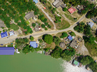 Aerial drone view of a small jetty by the riverside in Sedili Kecil, Johor, Malaysia