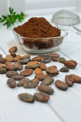 Wooden spoons of various gluten free flour (almond flour, amaranth seeds flour, buckwheat flour, rice flour, chick peas flour) from top view