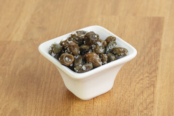 Salted marinated capers snack appetiser