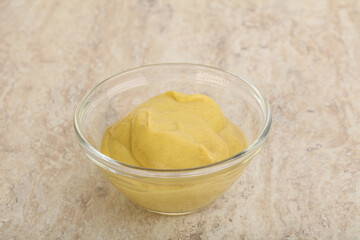Organic mustard sauce in the bowl