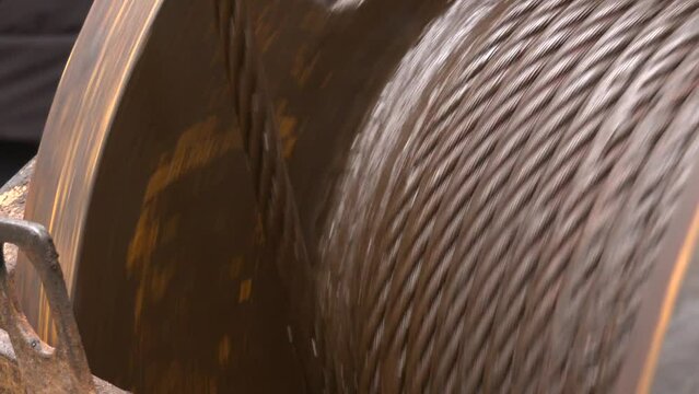 Wire rope sling or cable sling on crane reel drum or winch roll of crane the lifting machine in heavy industrial.