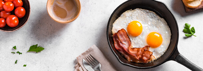 Fried eggs and bacon for breakfast