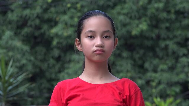 Serious Or Unhappy Filipina Asian Girl Child