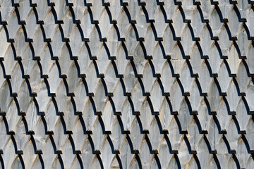 Fototapeta premium wooden roof tiles or shingel of Ringebu Stave Church, Oppland, Norway