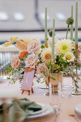 Wedding decor at the restaurant. Pink, gold, many pastel colors. 