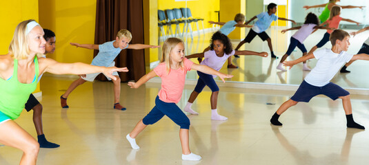 Active young children posing at dance class. High quality photo