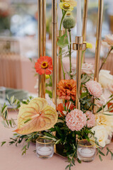 Wedding decor at the restaurant. Pink, gold, many pastel colors. 