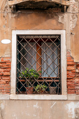 Shabby window Venice, Italy