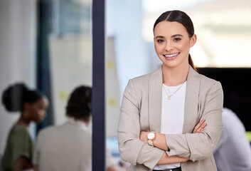 As soon as you trust yourself, you will know how to live. Shot of a businesswoman smiling at a...