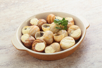 Delicous baked snail with butter - Escargot