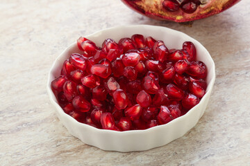 Ripe red Pomegranate seeds in the bowl