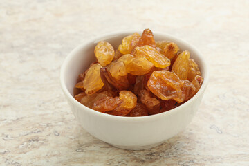 Sweet yellow raisin in the bowl