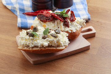 bruschetta with soft cheese capers and tomato
