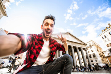 Fototapeta Happy tourist visiting Rome, Italy - Young man taking selfie in front of Pantheon, Italian landmark - Tourism and travel concept obraz