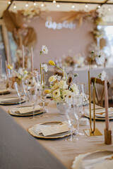 Wedding decor at the restaurant. Pink, gold, many pastel colors. 