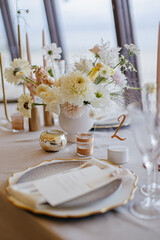 Wedding decor at the restaurant. Pink, gold, many pastel colors. 