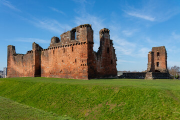 Penrith Castle on a beautiful spring day with blue skies behind. 