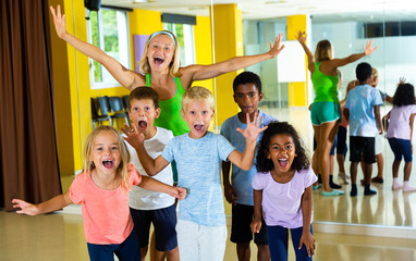 Happy children in dance studio smiling and having fun. High quality photo