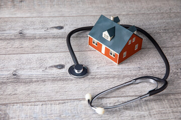 House model with stethoscope