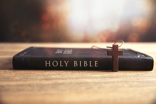 Holy Bible with wooden cross