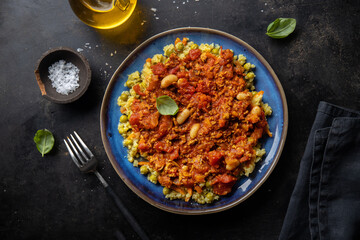 Noodles with tomato sauce and meat