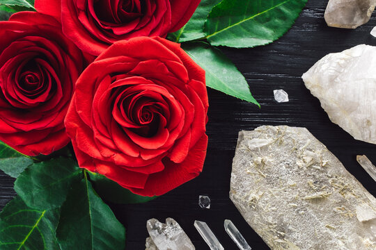 Red Roses and Mixed Quartz Points on Black Background
