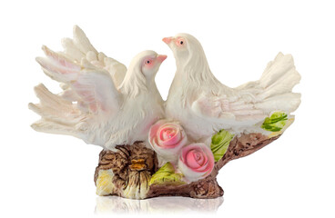 Figurine two doves. White birds on the tree isolated.