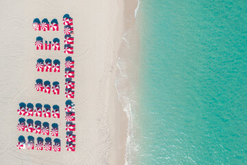 Beautiful red umbrellas on the beach in Miami Beach