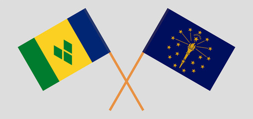 Crossed flags of Saint Vincent and the Grenadines and the State of Indiana. Official colors. Correct proportion