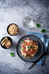 Warm backwheat pasta chicken vegetables salad with peanuts