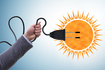 Solar energy concept with sun and socket