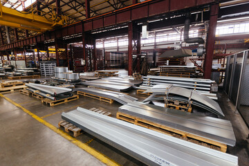 Metal profiled parts in metalworking factory
