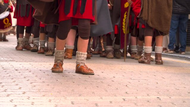 roman soldiers  walking in a historical reenactment in easter. People performing a Roman legion. 