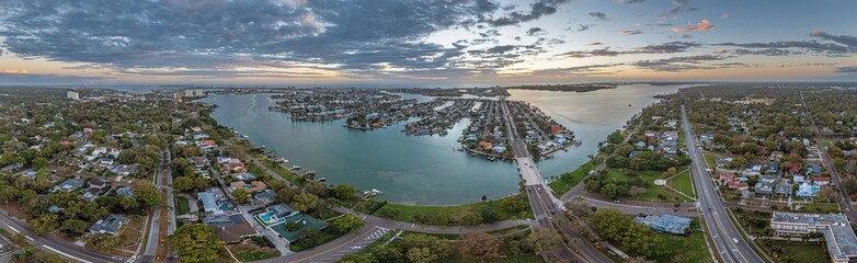 Fototapeta premium Drone panorama over South Causeway Isles and Treasure Island in St. Petersburg in Florida during sunset