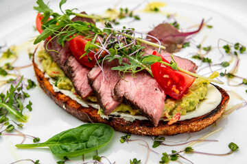 Bruschetta with tender beef, cream cheese and gluacomoli sauce