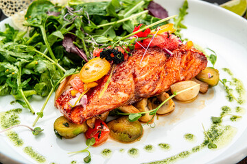 Grilled salmon fillet with vegetables mix.