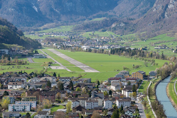 Fototapeta na wymiar Mollis airport in a fantastic mountain scenery in Switzerland