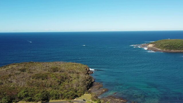 Aerial panorama of Ulladulla town harbour coast in Australia to harbour as 4k.
