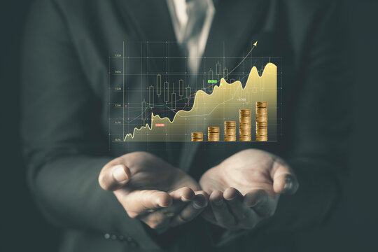 hand holding stock graph finance and banking concept.