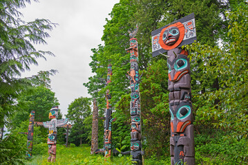 VANCOUVER - May 28, 2019: View of carved totem poles in Stanley Park, a popular lardmark and...