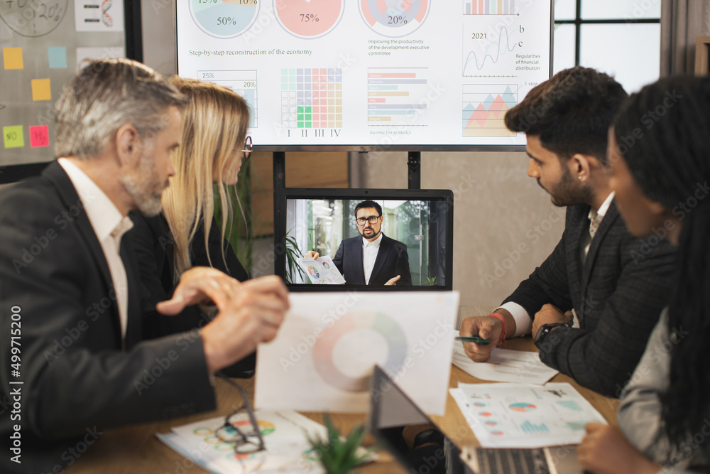 Wall mural electronic meeting concept. diverse group of multiracial business people in the conference room list