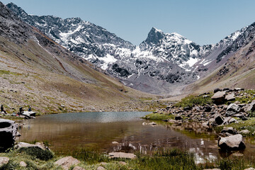 Close-up horizontal shot of El Morado Natural Monument and San Francisco Glacier next to the lagoon