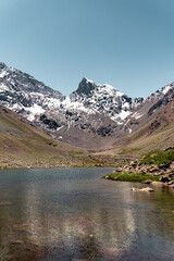 Vertical shot of El Morado Natural Monument with lagoon below