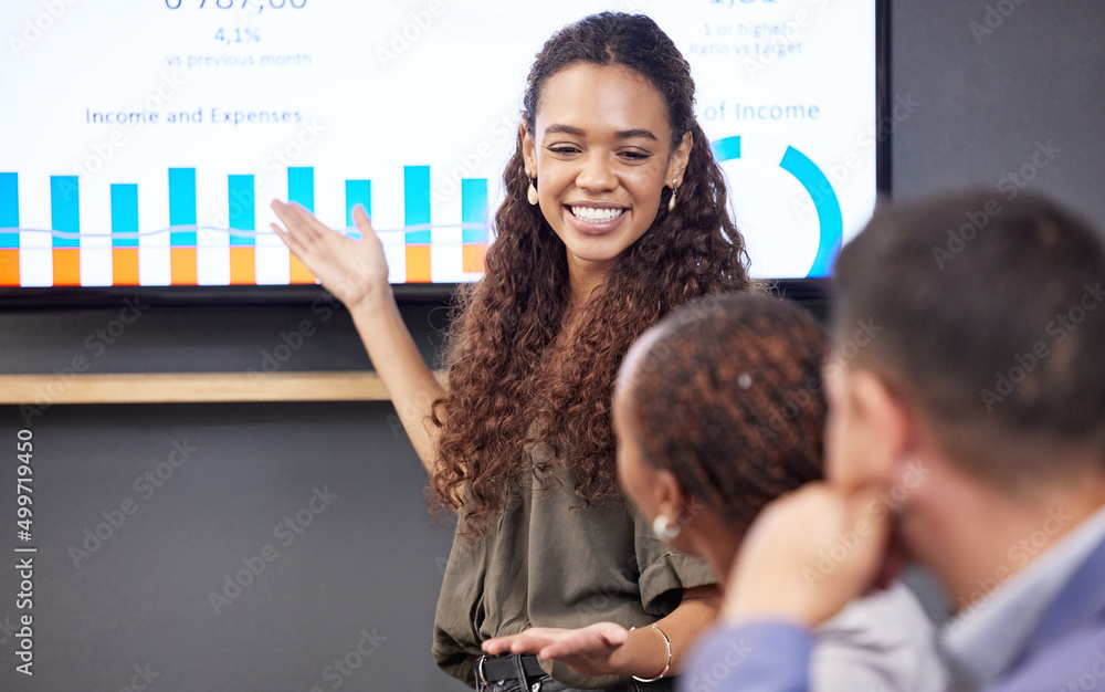 Poster this is what i want to show you. shot of a group of colleagues having a meeting in a boardroom at wo