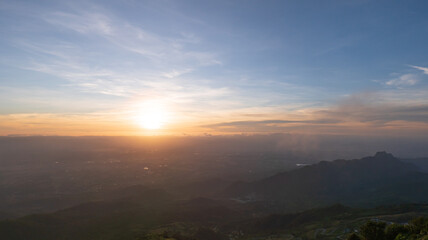 Bright orange sky and light of the sunrise at morning.