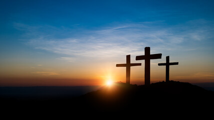 Cross crucifixion of jesus - Wooden cross at sunset sky background. Crucifixion and resurrection...