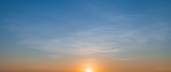 Naklejka na ściany i meble Beautiful golden sunrise sky and cloud in the morning time.